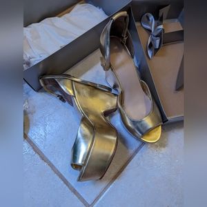 Gold high heel wedges